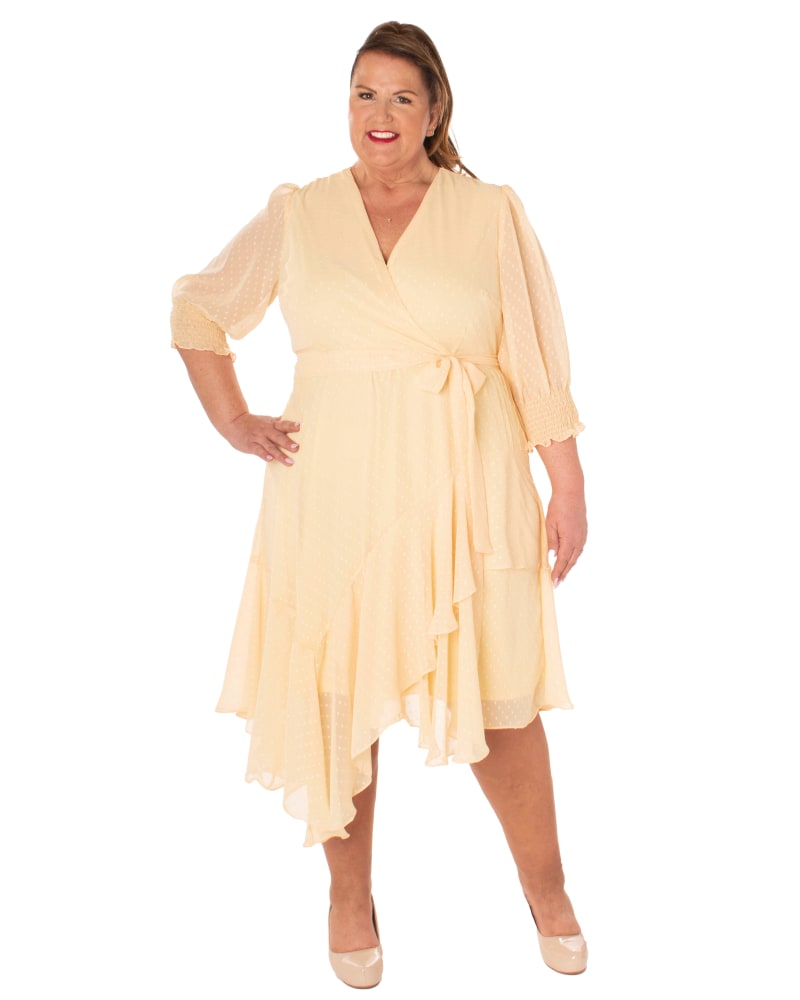 Plus size model wearing Joanna Ruffled Midi Wrap Dress by Maison Tara | Dia&Co | dia_product_style_image_id:186116